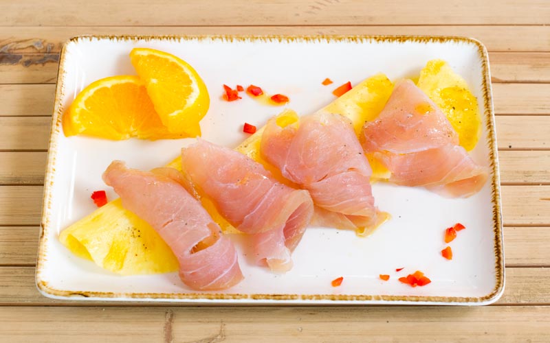 PalmBeach Tropical Restaurant | Sliced Marinated Amberjack with Pineapple | amberjack or grouper depending on availability, pineapple, extra virgin olive oil, pink pepper and spices