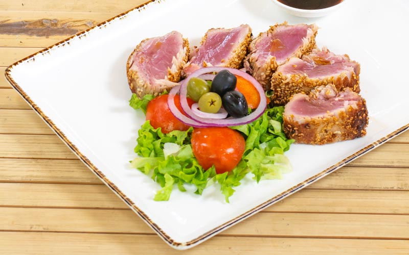 PalmBeach Tropical Restaurant | Tuna Tataki | seared tuna fillet in a crust with soy sauce and sesameseared tuna fillet with soy sauce and sesame crust, served with mixed green salad